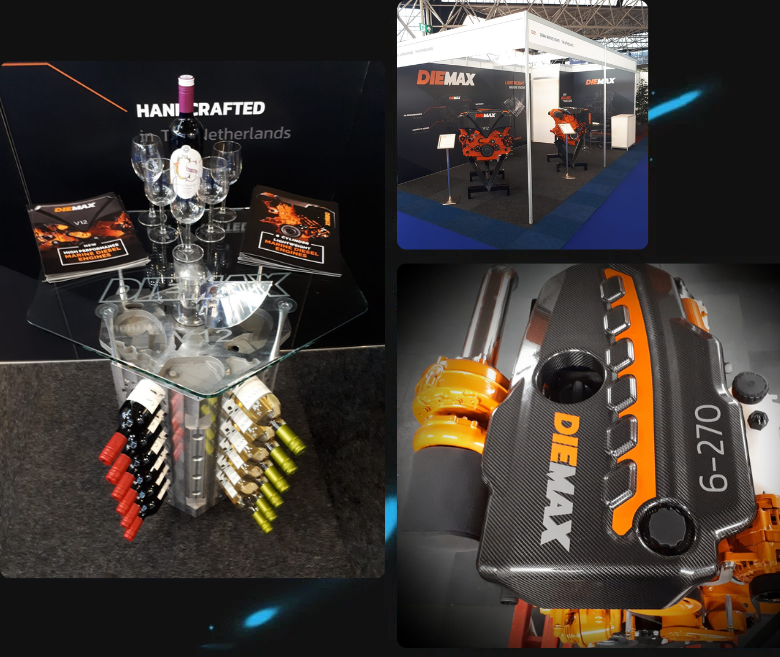 Expo Diemax: mesa, motores y stand de exhibición.